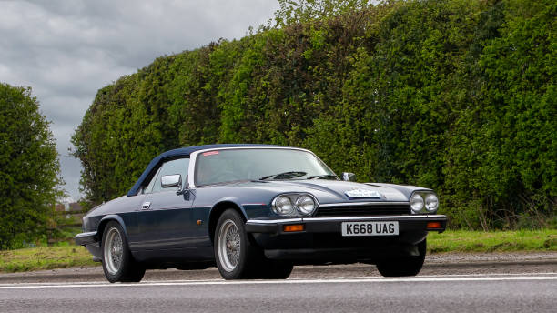 Bicester,Oxon,UK - April 23rd 2023. 1992 JAGUAR XJS  car travelling on an English country road